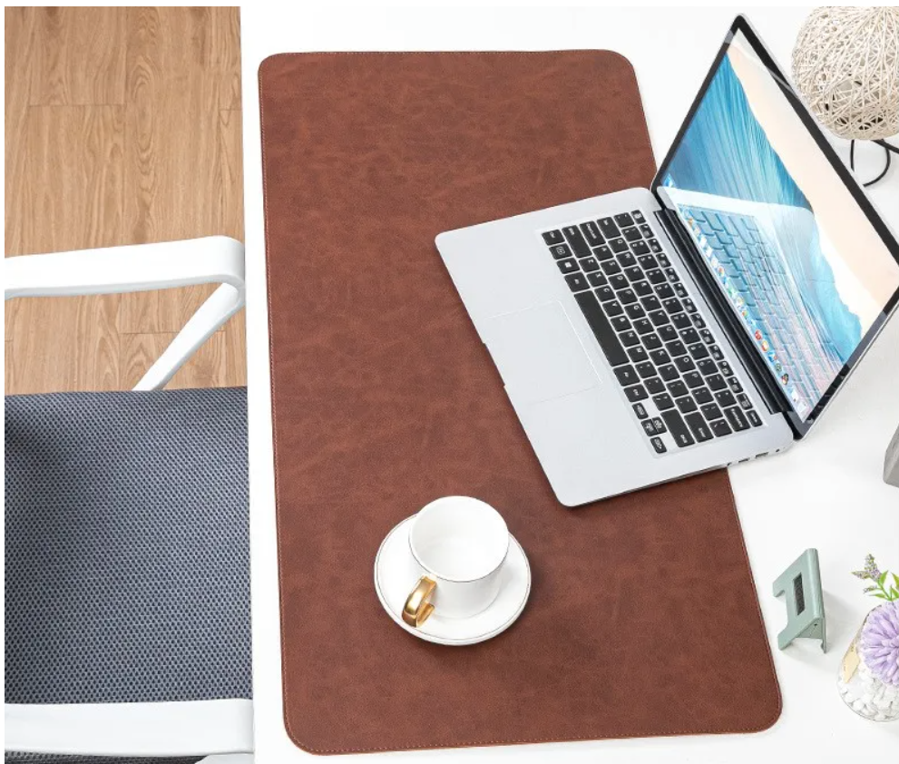 NOIRDEN leather desk mat close-up showing smooth surface texture and stitched edge detail